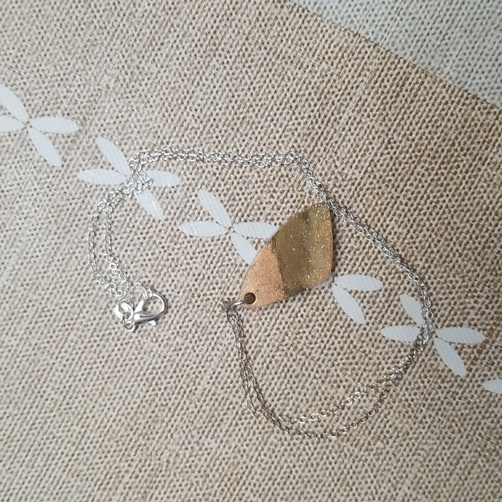 Handmade epoxy/resin necklace.